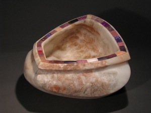 Large bowl from a single find of rare pink Alabaster gathered from the Anza-Borrego Desert in Southern California, inlaid with a varied gemstone rim.